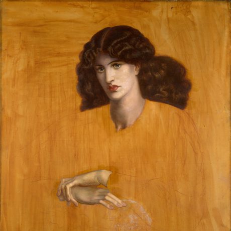 An unfinshed painting except for the face and hands of a woman with long wavy hair
