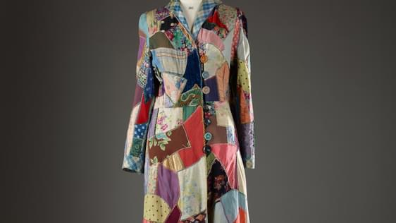 Robe-type garment, wrap over and button fastening at the front, made of pieces of scrap fabric