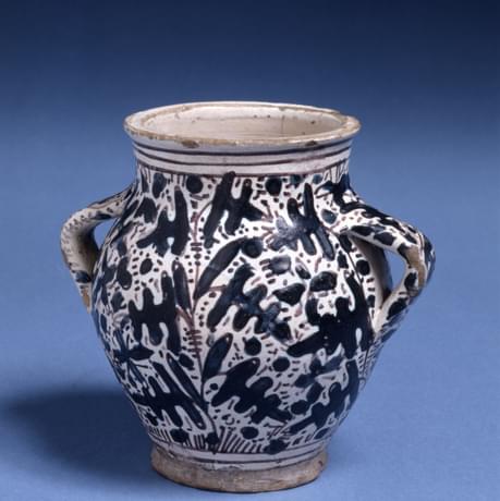 Ceramic blue and white patterned jar with two handles