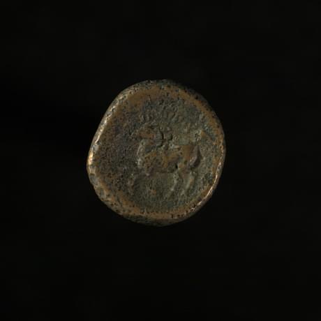 Dark coin, worn smooth, with a horse inscribed