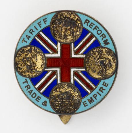 A badge with the Union Jack and 'tariff reform trade & empire' inscribed