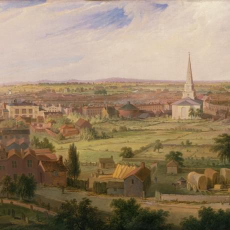 Painting - a panoramic view of a town from the top of a tall building there are green fields amongst densly packed housing
