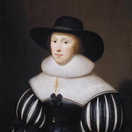 Portrait painting of a woman in a large brimmed hat wearing a white ruff, the sleeves of the dress are oversized and striped with black and white