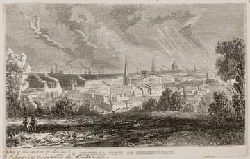 Old etching showing a distant view of a built-up town with church spires and smoking factory chimneys