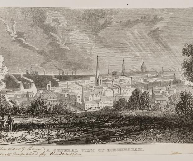 Old etching showing a distant view of a built-up town with church spires and smoking factory chimneys