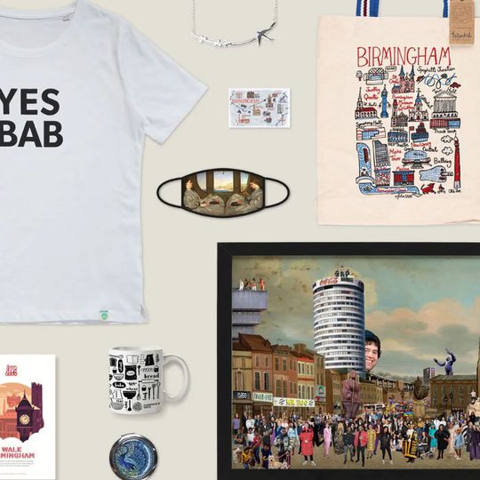 A selection of shop products including: t-shirt, artwork, mug, bag, book, mask, jewellery and mirror.