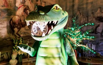Neverland - a indoor Peter Pan experience. Showing a crocodile with clock in its mouth.