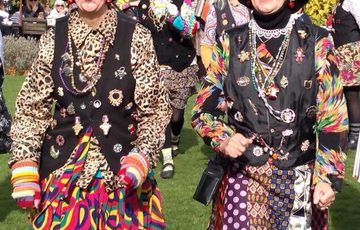 Two Molly dancers in costume.