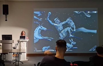 A person giving a presentation on a screen.