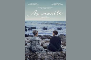 Ammonite film poster featuring film title and two people sitting on rocks in front of the sea, on a grey blue background.