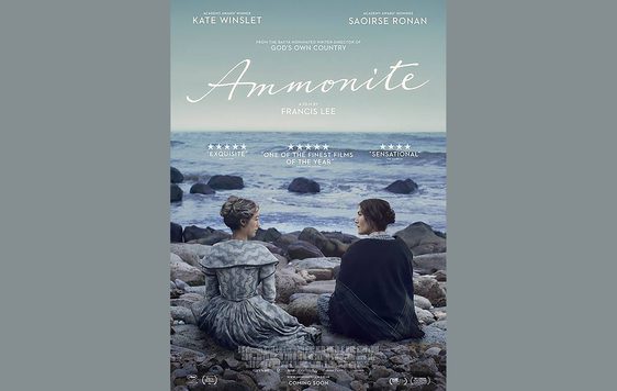 Ammonite film poster featuring film title and two people sitting on rocks in front of the sea, on a grey blue background.