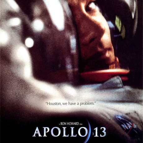 Movie poster featuring close up of an astronaut and title Apollo 13.