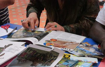 Picture of a lady's hands holding a magazine