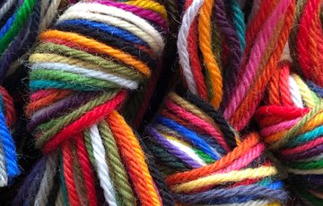 Close up of multi-coloured wool.