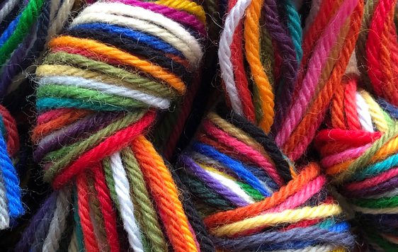 Close up of multi-coloured wool.