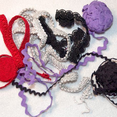 A collection of fabric ribbon edging.