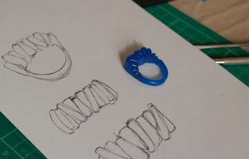 A ring design sketched on paper.