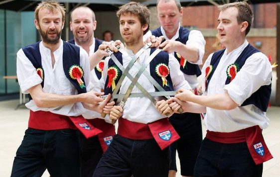 Group of people dancing.