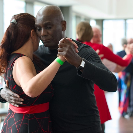 Two people dancing together.
