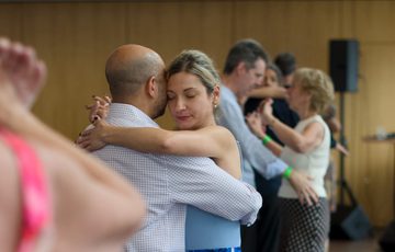Two people dancing together.