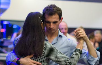Two people dancing together.