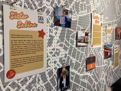 A closeup of photos and information on a display.