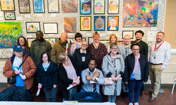 Citizens from Midland Mencap are pictured proudly in front of their artwork at the Birmingham Museum and Art Gallery.