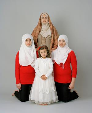 Women from a British Asian family posed for a photo.