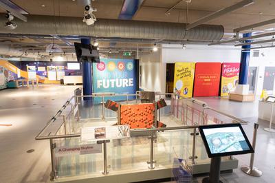 The Gas holder exhibition with the giant metal plate in the centre and display boards around the edge