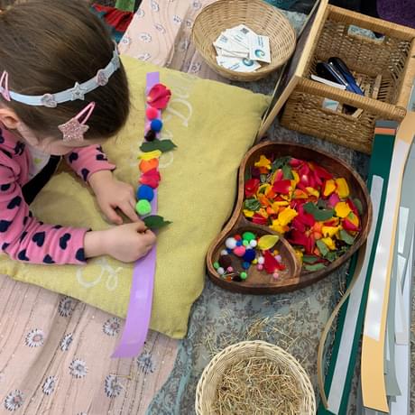 Child taking part in a crafts activity.