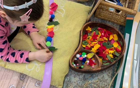 Child taking part in a crafts activity.