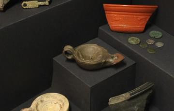 Roman items including oil lamps, coins, mosaic fragments, pottery shards etc.