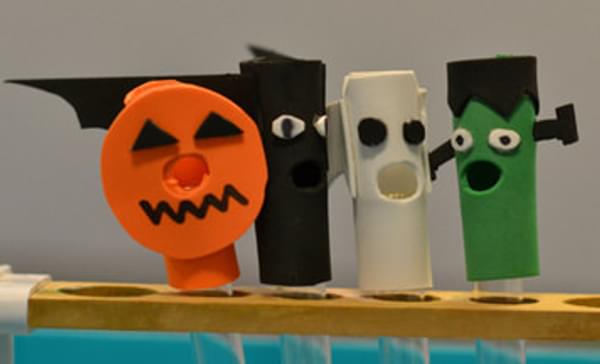 Four spooky hand-made characters! A Jack-o-lantern, a bat, a ghost & Frankensteins monster all stood in a row.