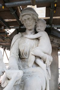 Charity figure with child looking cleaner after second clean.