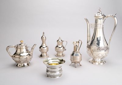 Group of silverware including, cream jug, coffee pot, mustard pot, pepper pot and teapot and sugar bowl.