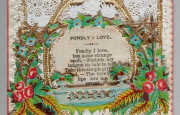 Victorian Valentine card with floral borders, golden accents, and a poetic love message in the centre.