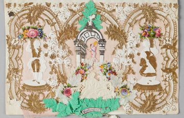 Intricate Victorian lace paper art, cherub centrepiece, floral accents, gold and green embellishments.
