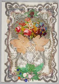 Ornate lace-bordered card with colourful flowers, leaves, and a small heartfelt message.