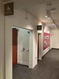 Entrance to the toilet area with signs.