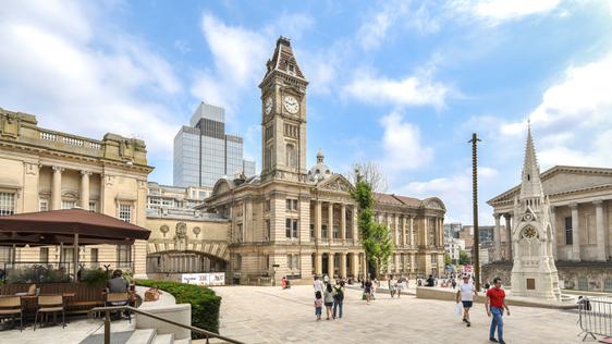 Museum in square with Chamberlain memorial and town hall