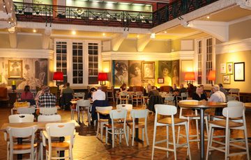 People sitting in the tearoom.