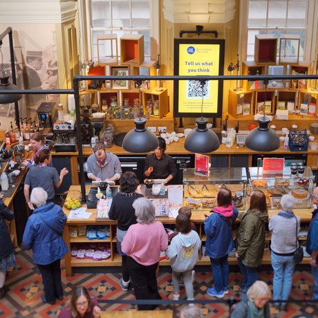 A busy tearoom food counter from above.