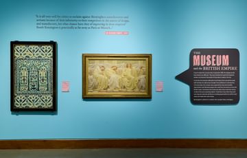 Two artworks on the wall.