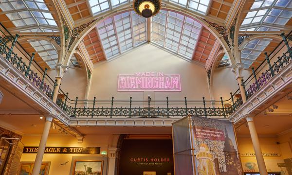 The Industrial Gallery ceiling with large neon sign that says 'Made in Birmingham'.