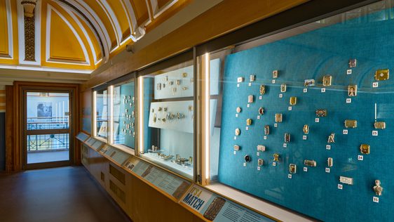 Side view of the display cases containing vesta cases.