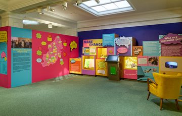 The Citizen Jury display area with bright coloured display cases featuring speech bubbles.