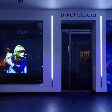 A video of Ozzy Osbourne performing on display in the pixel studio.