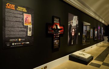 An introduction panel and objects on display.
