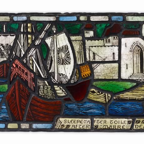 Stained glass in two panels. Featuring two medievals ship in front of city walls.
