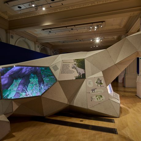 A life-sized 3D model of an an animal with screen on the side.